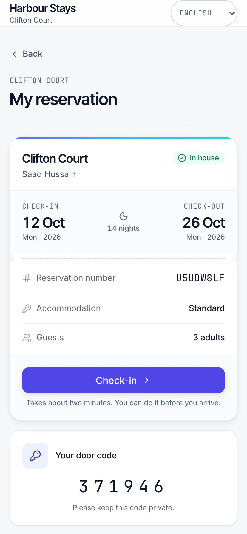 The reservation screen showing the stay, the reservation number, and the released door code
